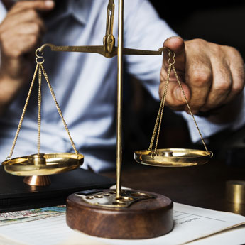 Touching Scales of Justice Touching Scales of Justice